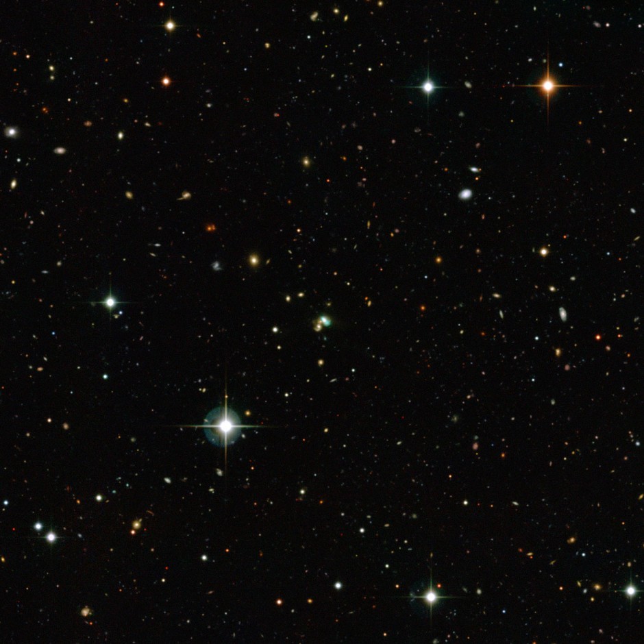 This view from the Canada-France-Hawaii Telescope shows thousands of galaxies in the distant Universe. But the one close to the centre looks very odd — it is bright green. This very unusual object is known as J224024.1−092748 or J2240 and it is a bright example of a new class of objects that have been nicknamed green bean galaxies. Green beans are entire galaxies that are glowing under the intense radiation from the region around a central black hole. J2240 lies in the constellation of Aquarius (The Water Bearer) and its light has taken about 3.7 billion years to reach Earth.

Credit:

CFHT/ESO/M. Schirmer